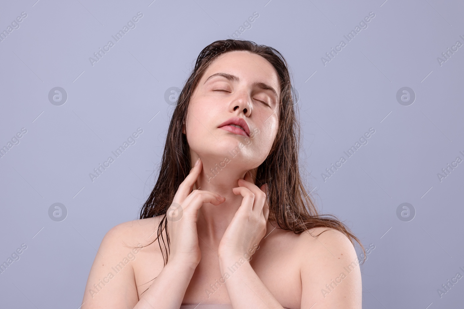 Photo of Beautiful woman with natural skin complexion on grey background, closeup