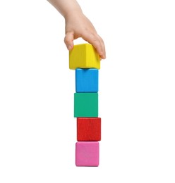 Photo of Child playing with colorful cubes on white background, closeup