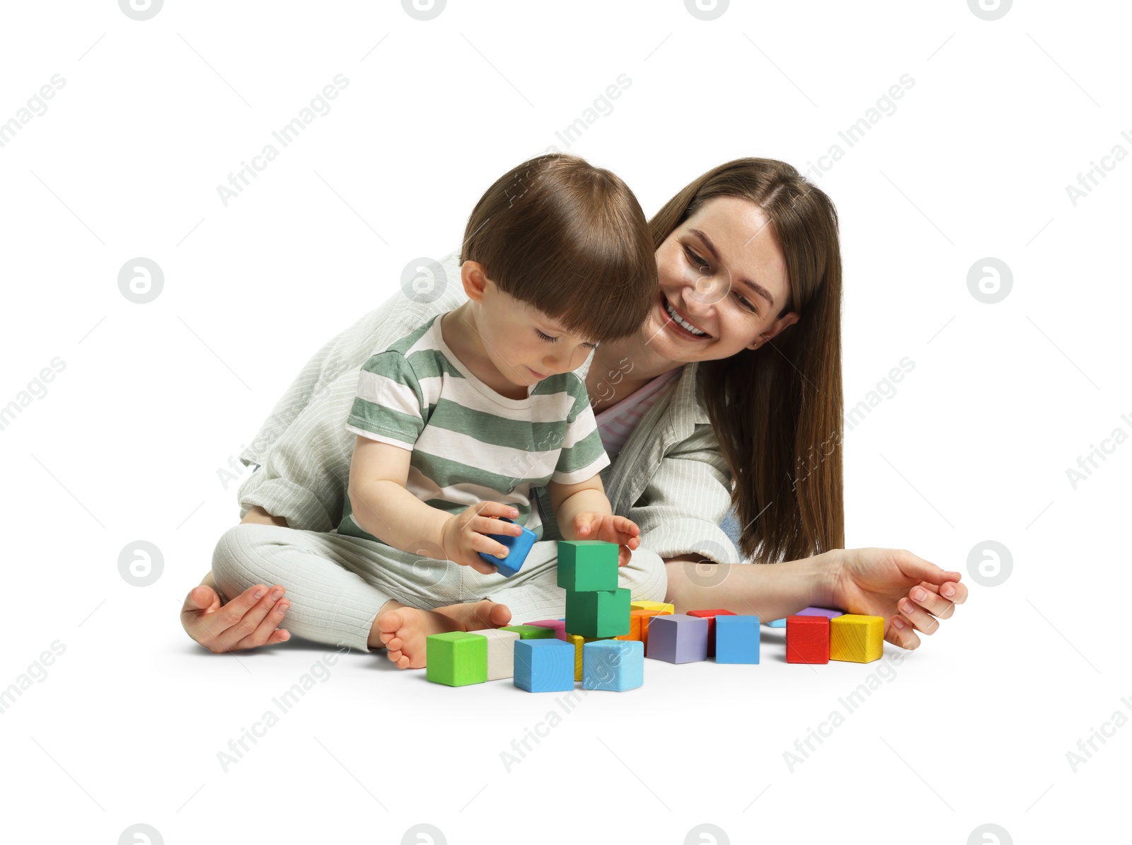 Photo of Mother and son playing with colorful cubes on white background