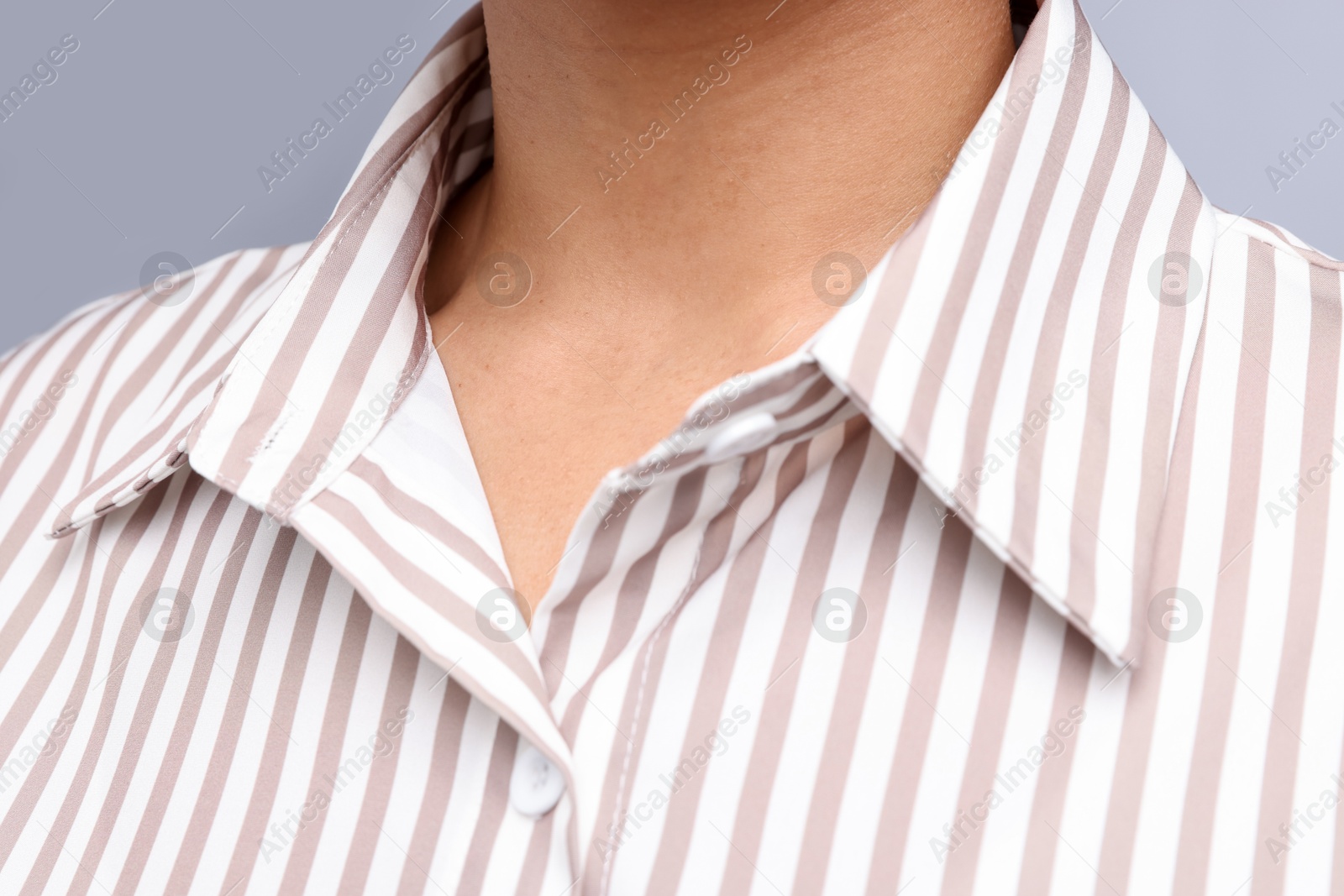 Photo of Young woman with healthy skin on light grey background, closeup