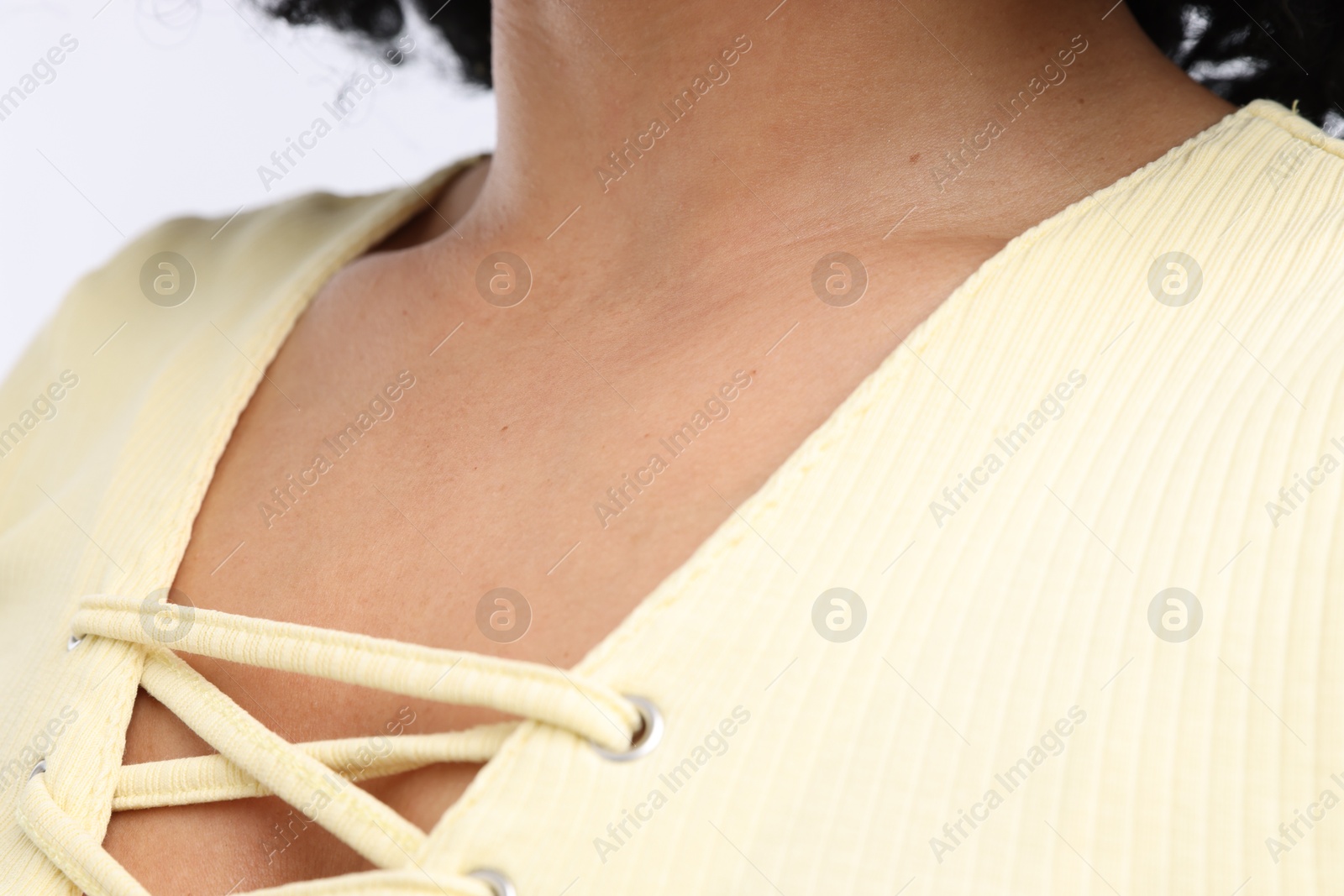 Photo of Young woman with healthy skin on white background, closeup
