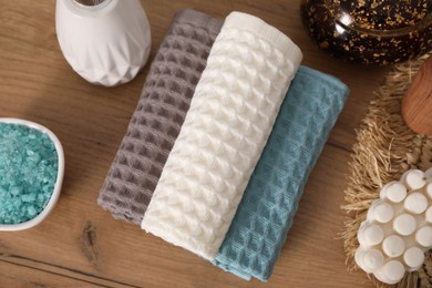 Photo of Flat lay composition with waffle towels on wooden table