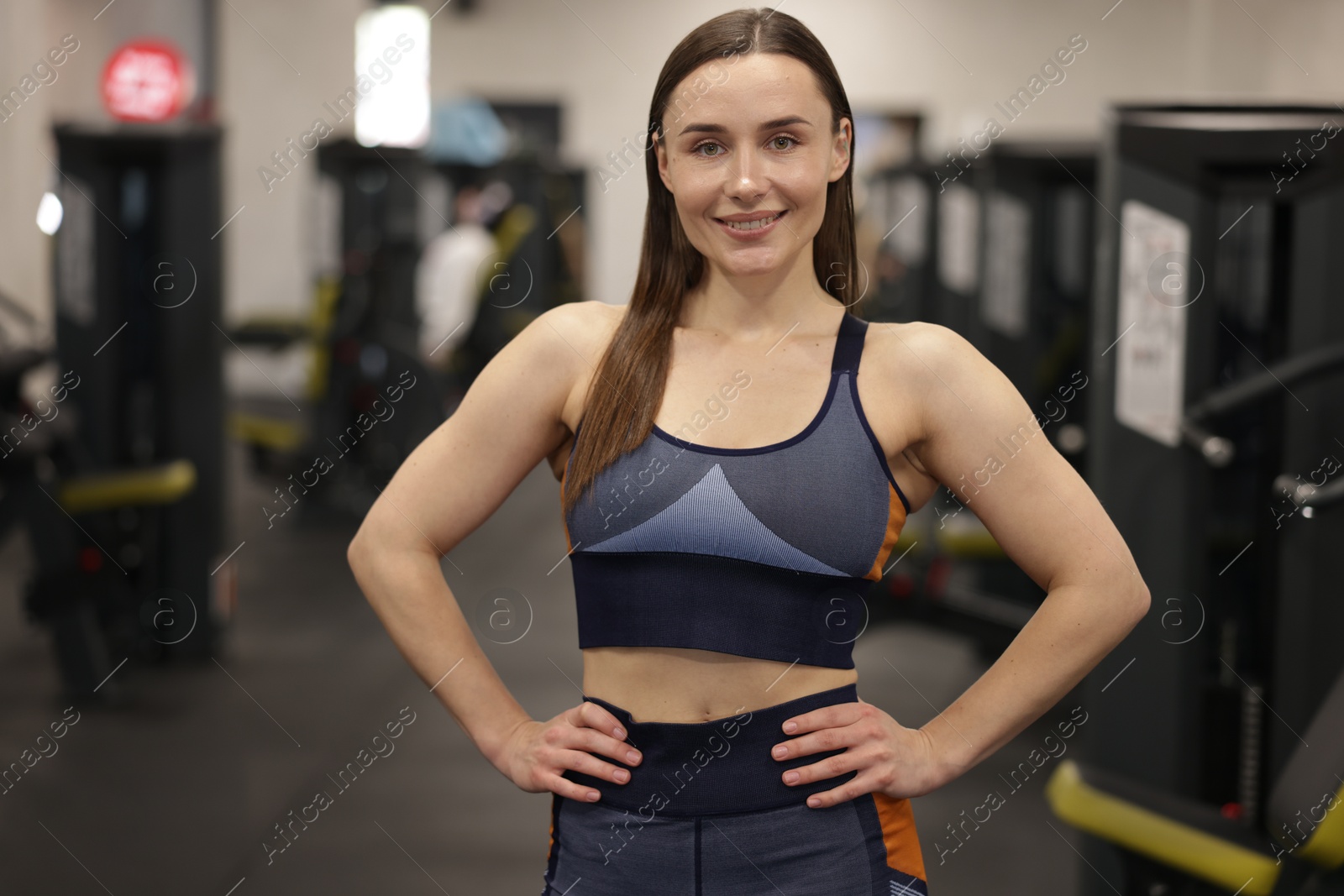 Photo of Portrait of professional personal trainer in gym