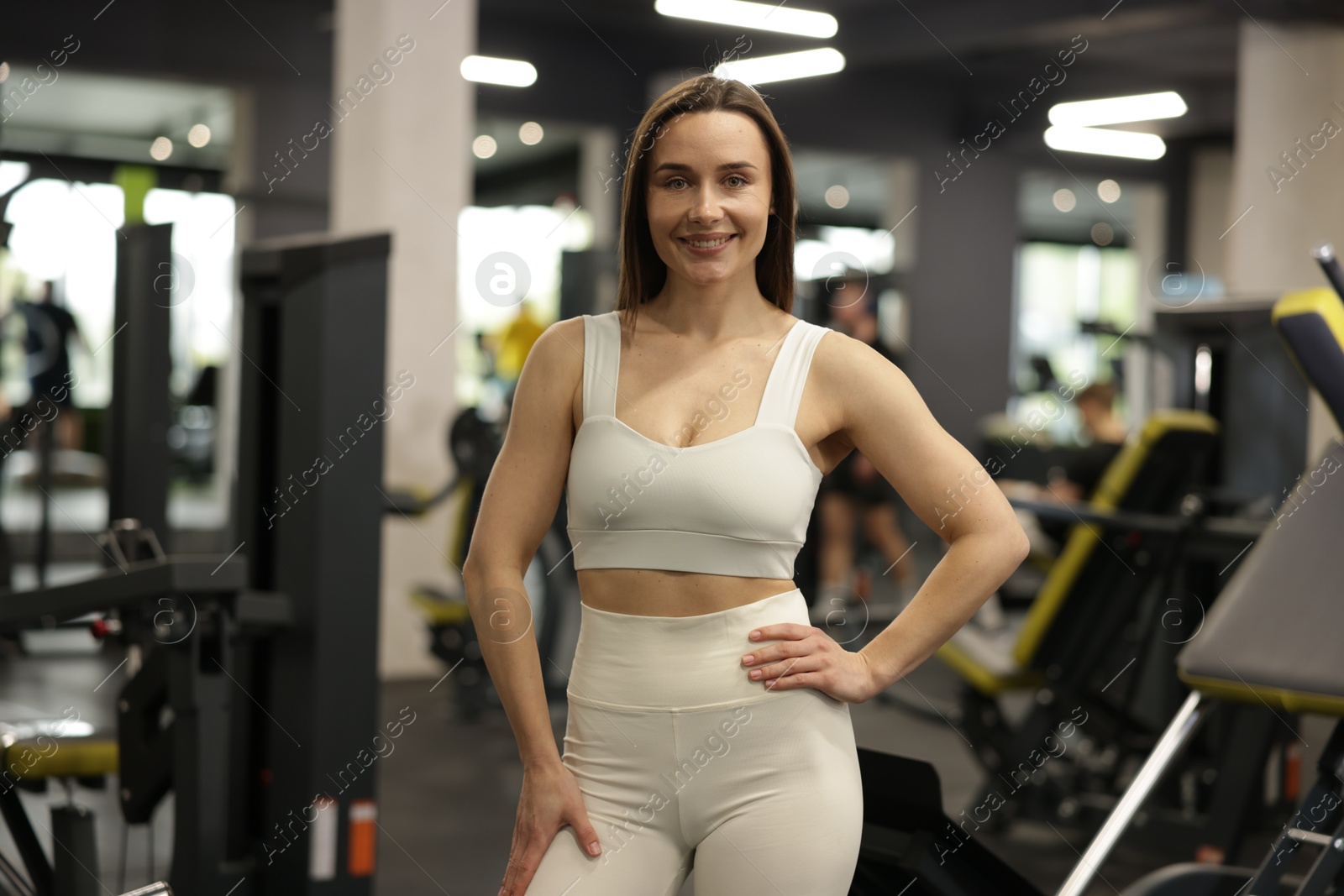 Photo of Portrait of professional personal trainer in gym