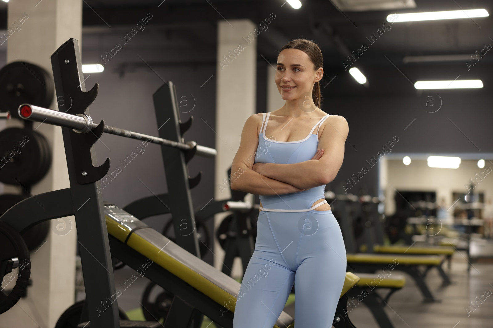 Photo of Portrait of professional personal trainer in gym