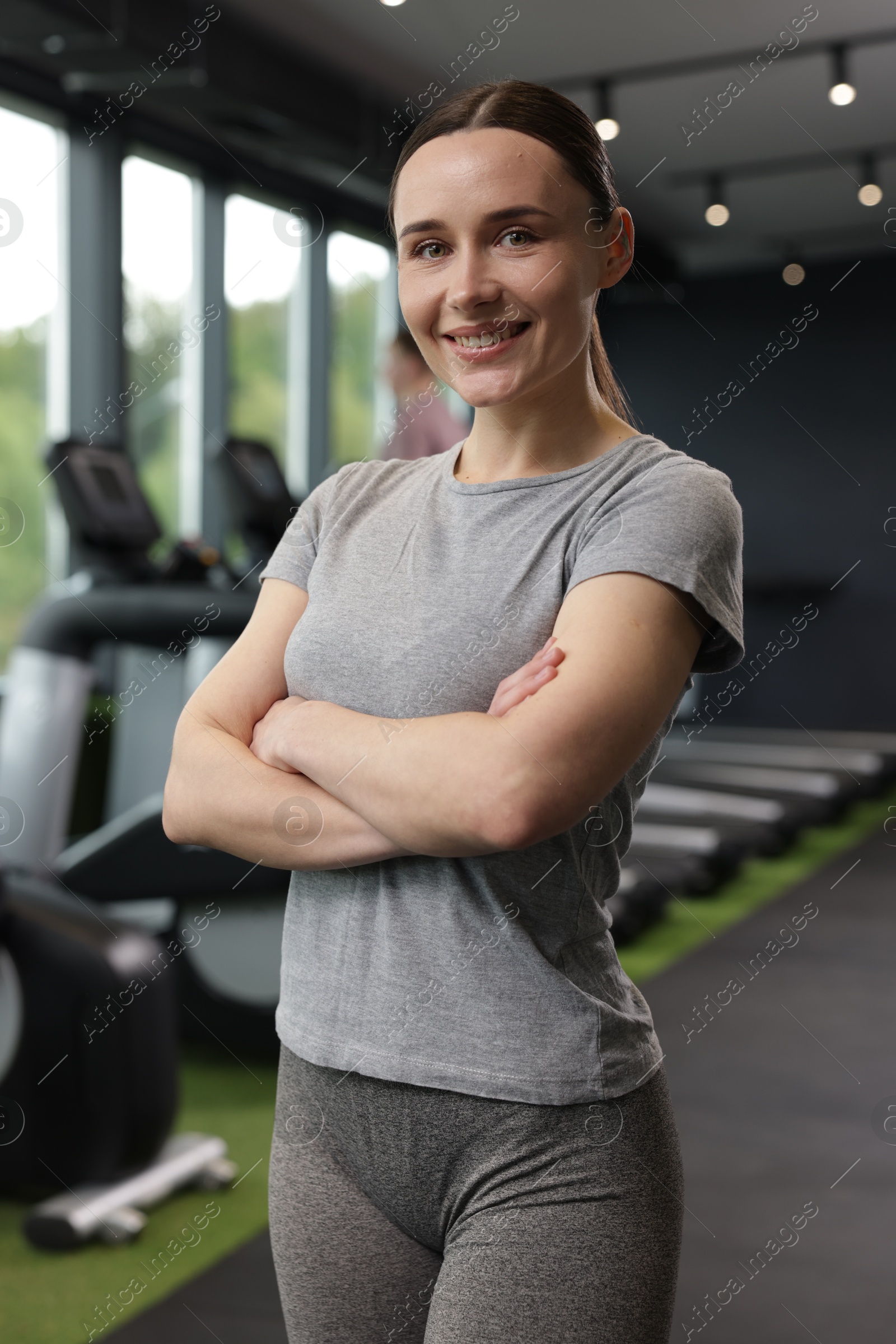 Photo of Portrait of personal trainer in sport center