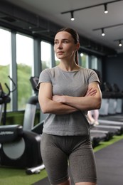 Photo of Portrait of personal trainer in sport center