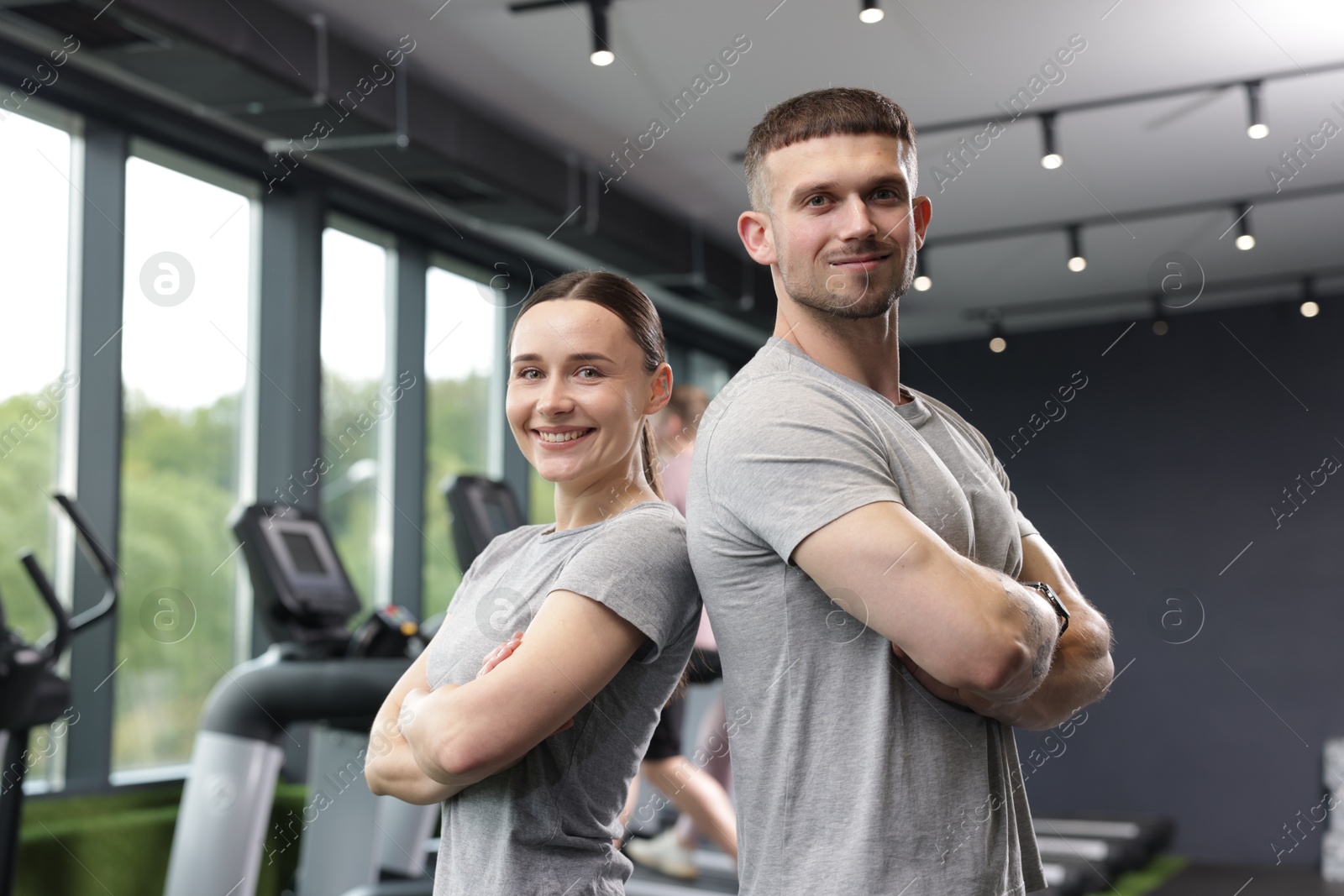 Portrait of personal trainers in sport center Photo of Portrait of personal trainers in sport center