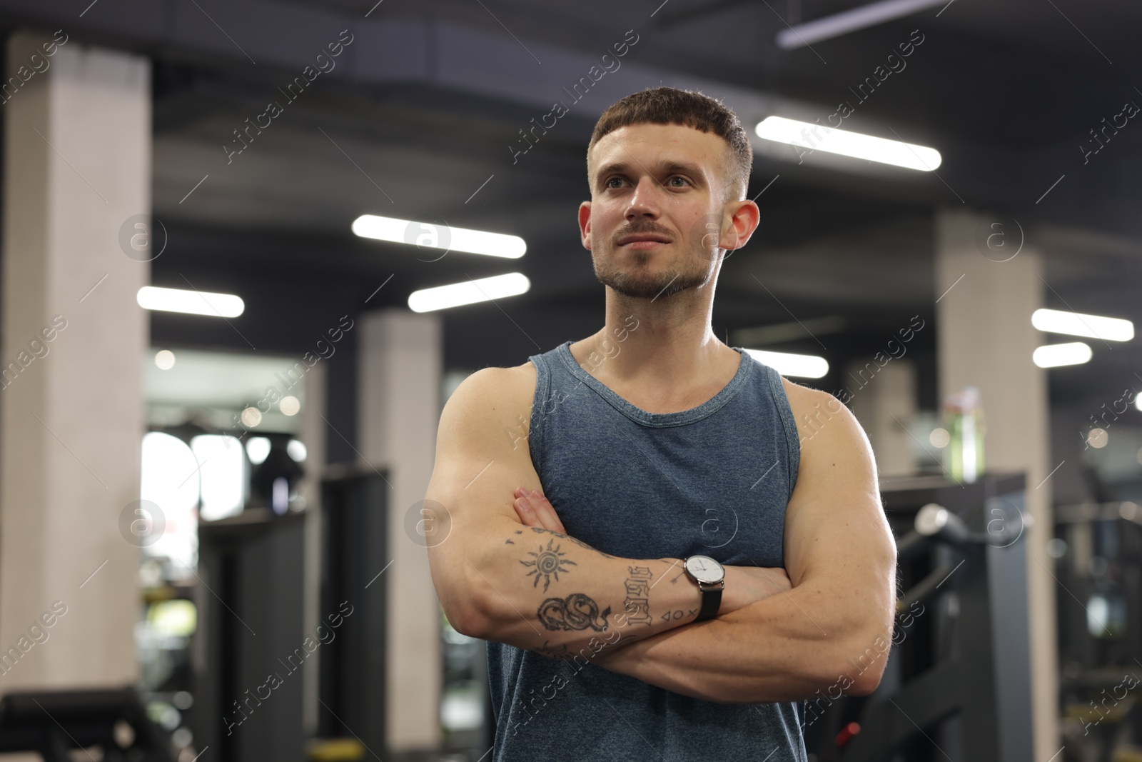 Portrait of professional personal trainer in gym. Space for text Photo of Portrait of professional personal trainer in gym. Space for text
