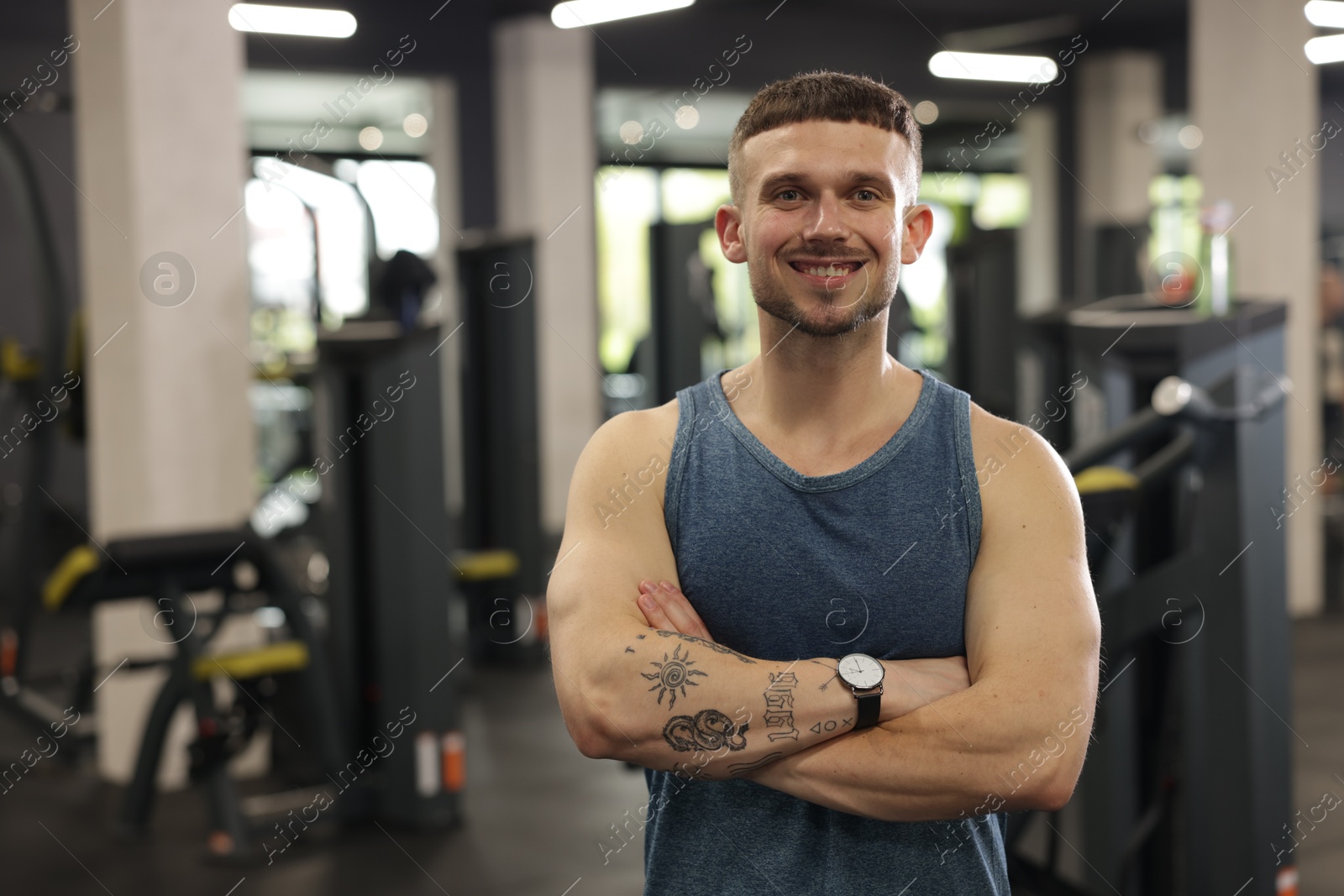 Portrait of professional personal trainer in gym. Space for text Photo of Portrait of professional personal trainer in gym. Space for text