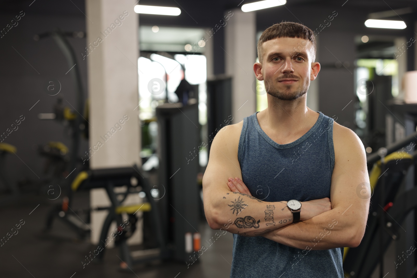 Portrait of professional personal trainer in gym. Space for text Photo of Portrait of professional personal trainer in gym. Space for text
