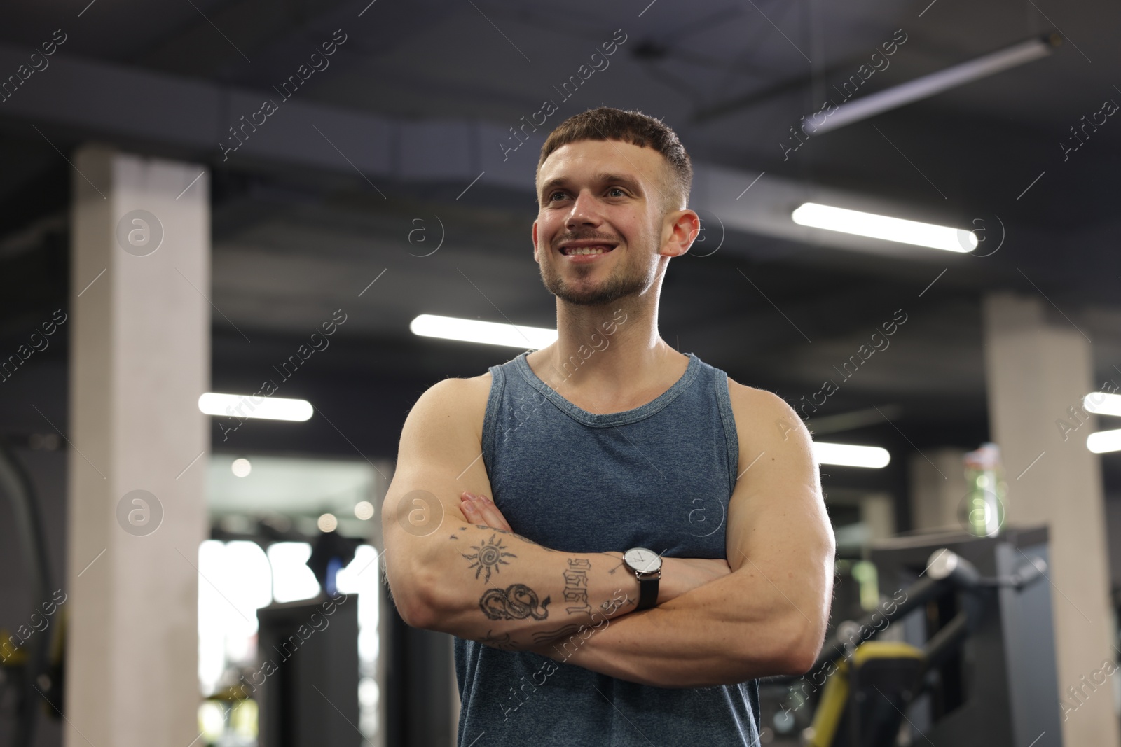 Portrait of professional personal trainer in gym. Space for text Photo of Portrait of professional personal trainer in gym. Space for text