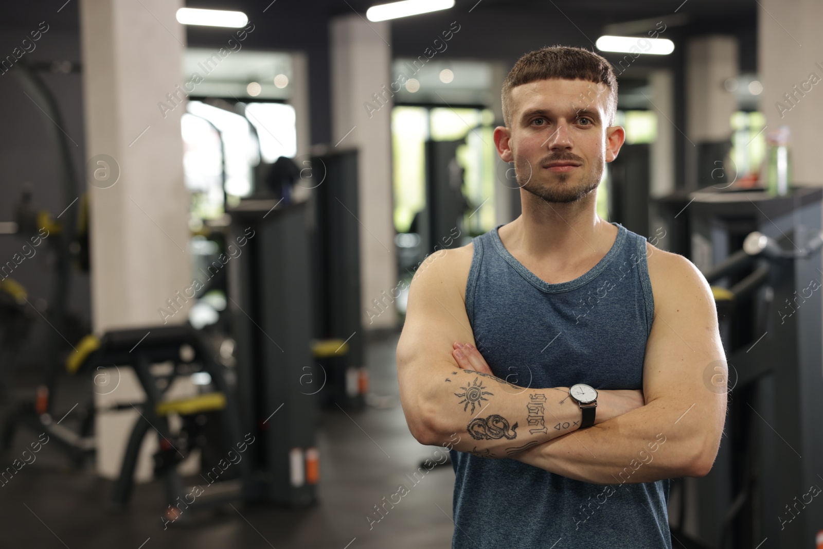 Portrait of professional personal trainer in gym. Space for text Photo of Portrait of professional personal trainer in gym. Space for text