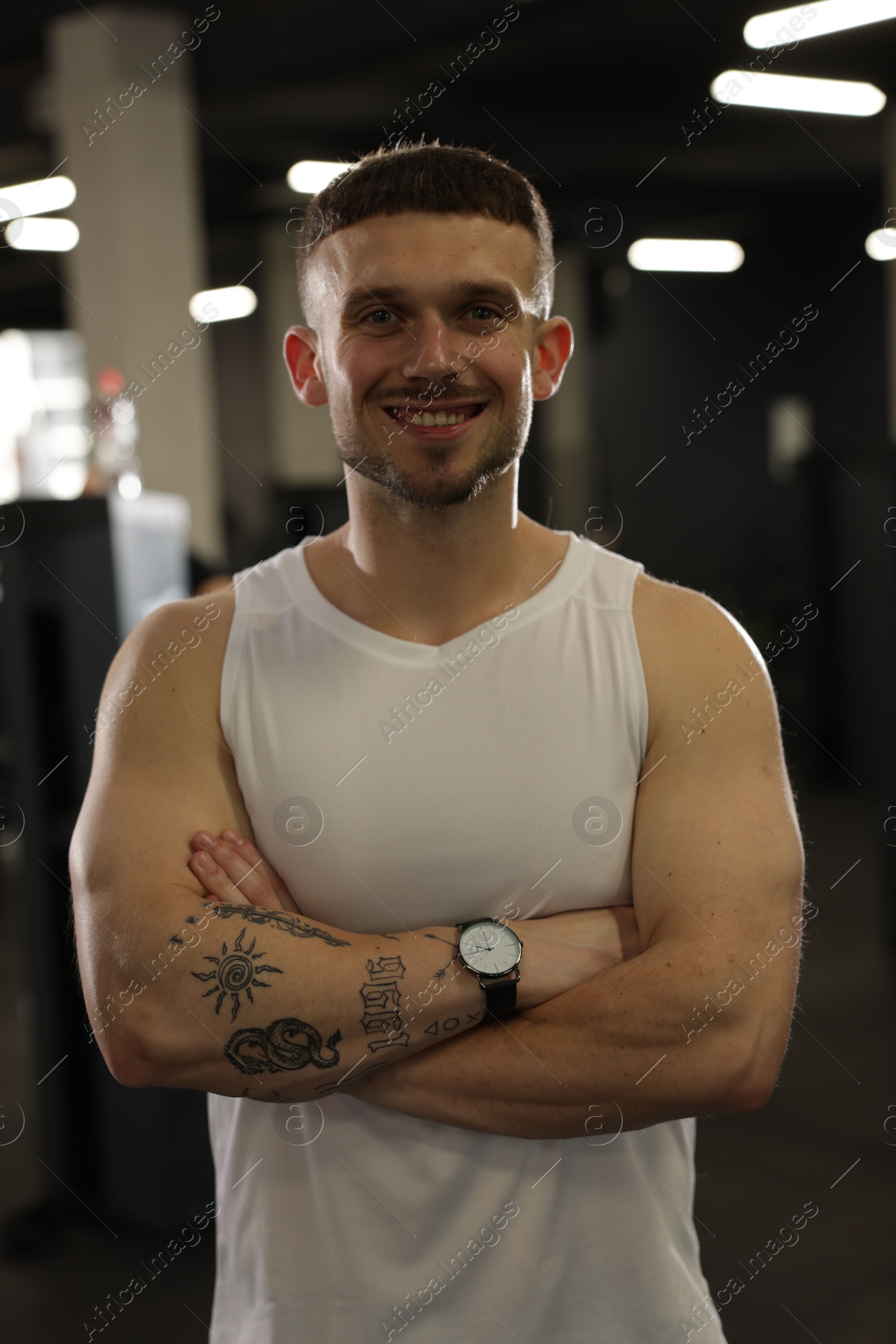 Portrait of professional personal trainer in gym Photo of Portrait of professional personal trainer in gym
