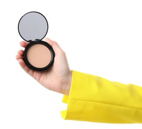 Photo of Woman holding open face powder with mirror on white background, closeup