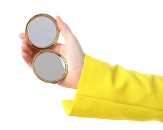 Photo of Woman holding open pocket mirror on white background, closeup