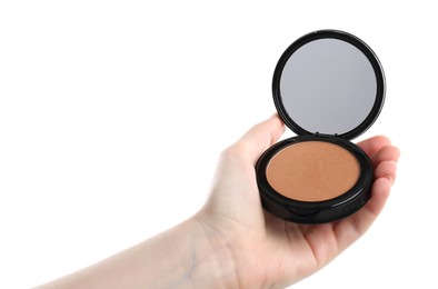 Photo of Woman holding open face powder with mirror on white background, closeup