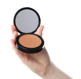 Photo of Woman holding open face powder with mirror on white background, closeup