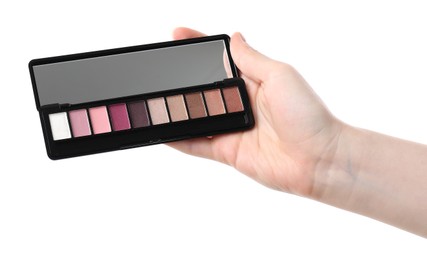Photo of Woman holding eyeshadow palette with mirror on white background, closeup