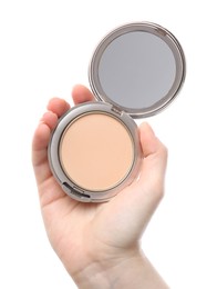 Photo of Woman holding open face powder with mirror on white background, closeup