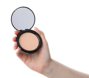 Photo of Woman holding open face powder with mirror on white background, closeup