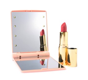 Photo of Open pocket mirror and lipstick isolated on white