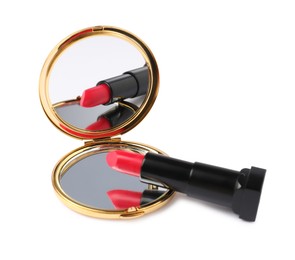 Photo of Open pocket mirror and lipstick isolated on white