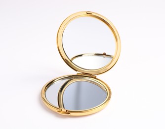 Photo of One open pocket mirror isolated on white