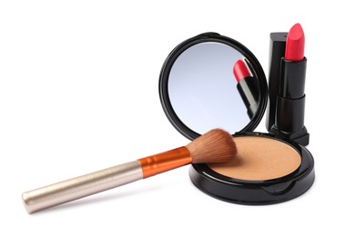 Photo of Open face powder with mirror, brush and lipstick isolated on white
