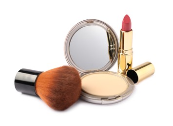 Photo of Open face powder with mirror, brush and lipstick isolated on white
