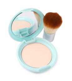 Photo of Open face powder with mirror and brush isolated on white, above view