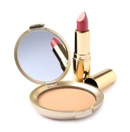 Photo of Open face powder with mirror and lipstick isolated on white