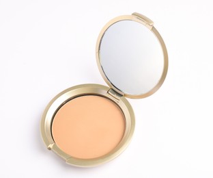Photo of Open face powder with mirror on white background, above view