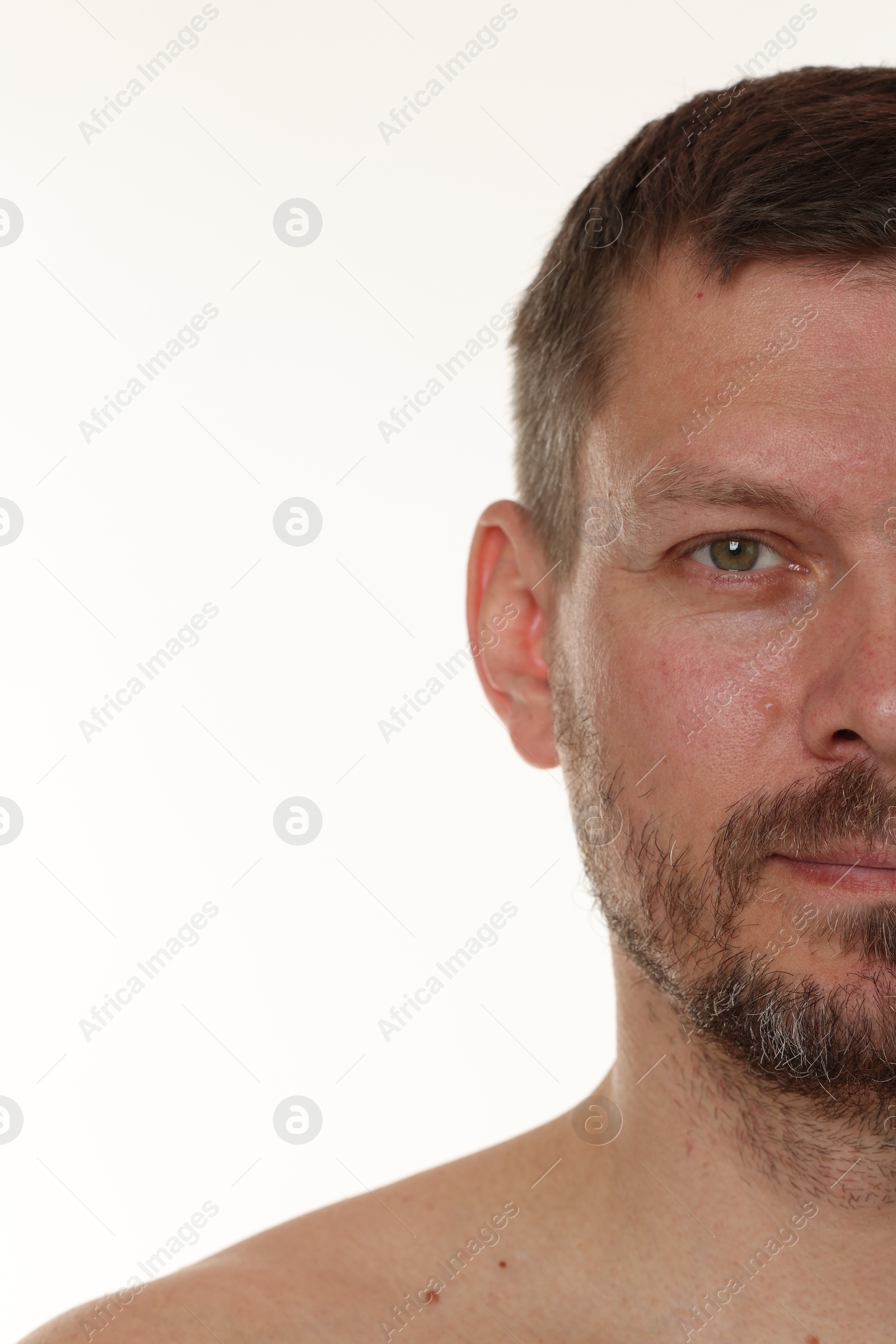 Photo of Handsome man with beard on white background