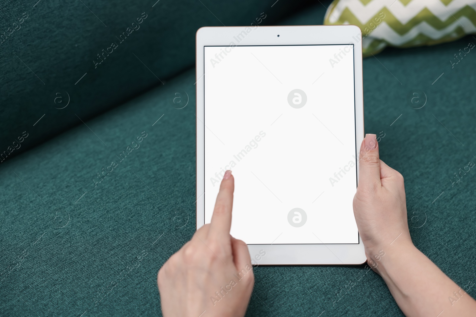 Woman with modern tablet at home, closeup. Space for text Photo of Woman with modern tablet at home, closeup. Space for text