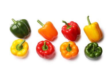 Photo of Fresh colorful bell peppers isolated on white, top view
