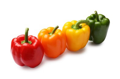 Photo of Fresh colorful bell peppers isolated on white