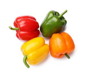 Photo of Fresh colorful bell peppers isolated on white, top view