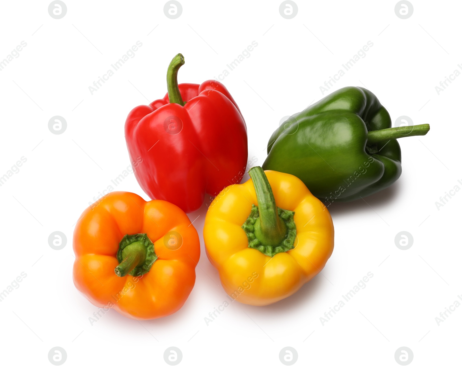 Fresh colorful bell peppers isolated on white, top view Photo of Fresh colorful bell peppers isolated on white, top view