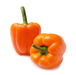 Photo of Fresh orange bell peppers isolated on white