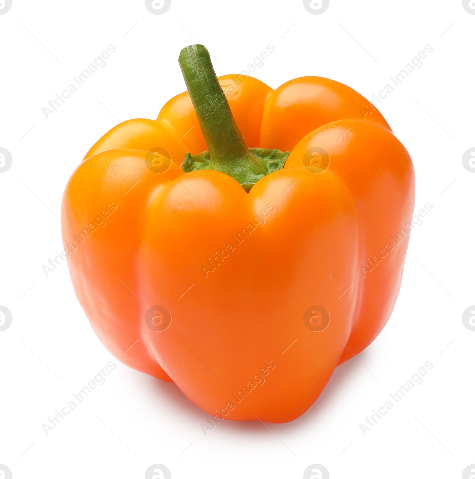One fresh orange bell pepper isolated on white Photo of One fresh orange bell pepper isolated on white