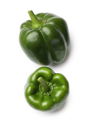 Photo of Fresh green bell peppers isolated on white, top view