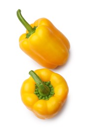 Photo of Fresh yellow bell peppers isolated on white, top view
