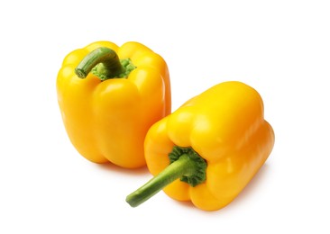 Photo of Fresh yellow bell peppers isolated on white