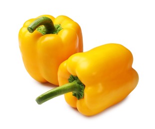 Photo of Fresh yellow bell peppers isolated on white