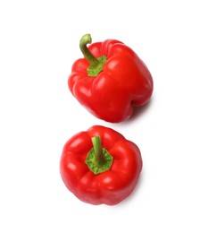 Photo of Fresh red bell peppers isolated on white, top view