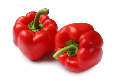 Photo of Fresh red bell peppers isolated on white