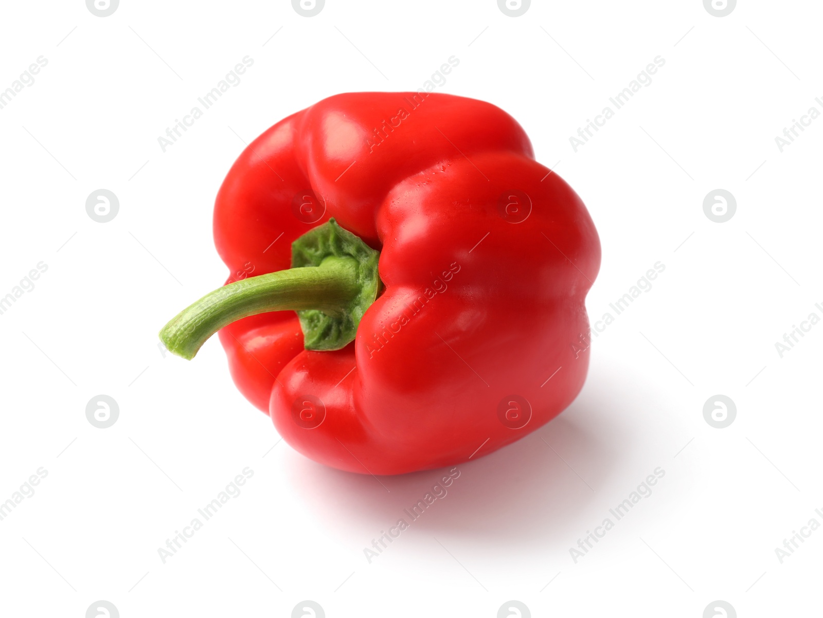 One fresh red bell pepper isolated on white Photo of One fresh red bell pepper isolated on white