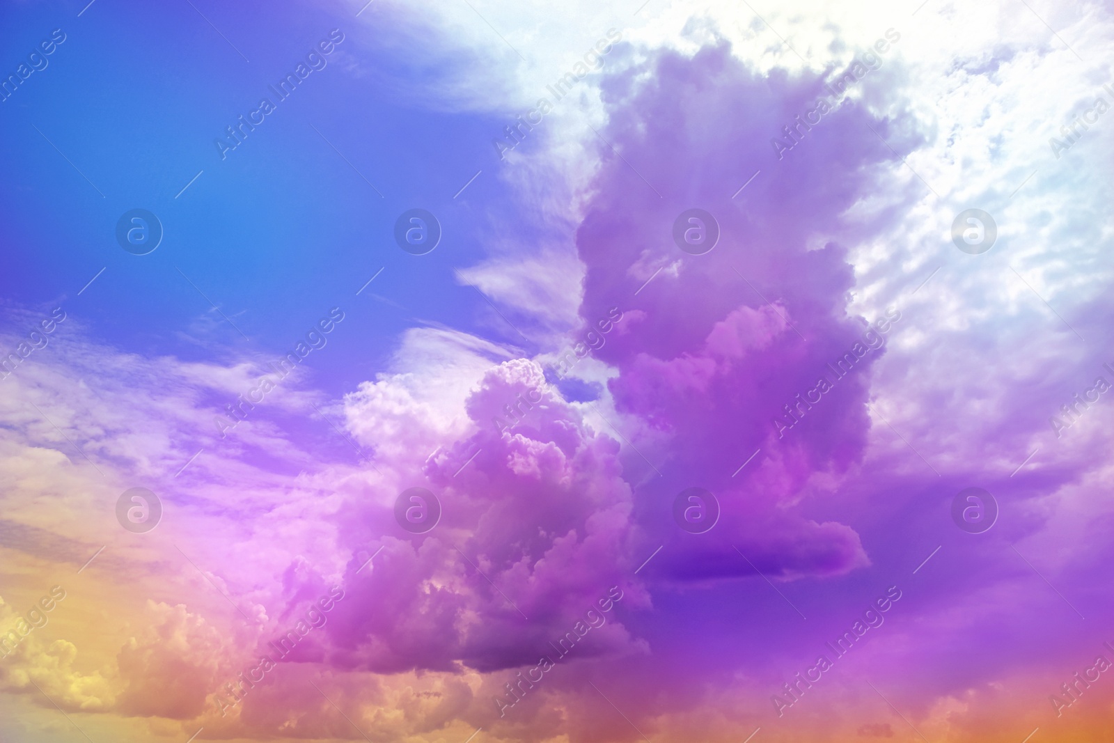 Fluffy color clouds floating in beautiful blue sky Image of Fluffy color clouds floating in beautiful blue sky