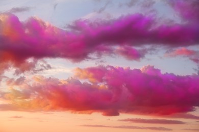 Image of Fluffy color clouds floating in beautiful sky